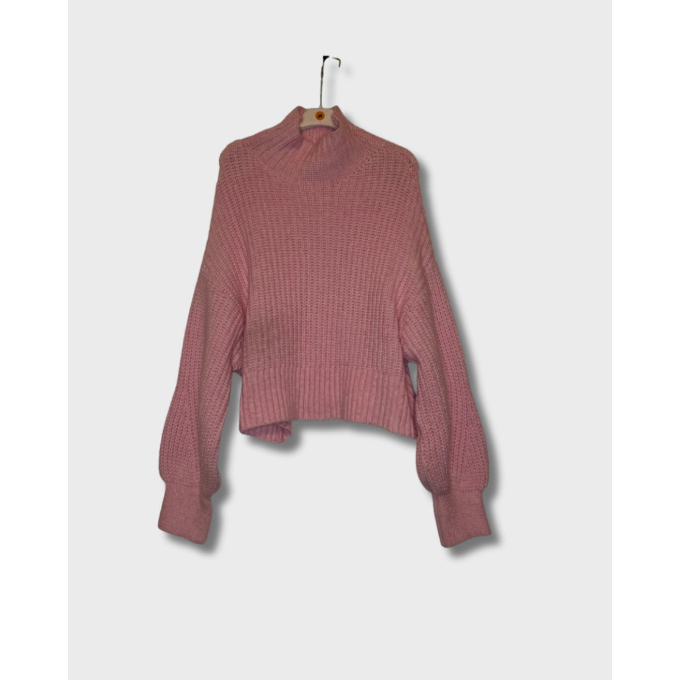 Suéter de cuello alto rosa