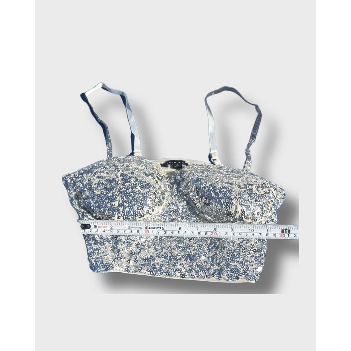 Top corsé plateado con lentejuelas de Heute Monde. Talla pequeña.